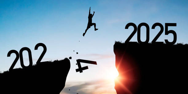 Welcome merry Christmas and happy new year in 2025,Silhouette Man jumping from 2024 cliff to 2025 cliff with cloud blue sky and sunlight.